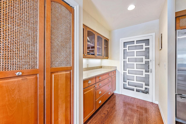 interior space featuring dark wood-style flooring and recessed lighting