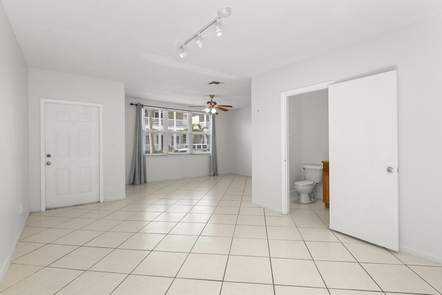 10531 NW 57th St, Coral Springs, FL 33076 - spare room featuring ceiling fan and light tile patterned floors