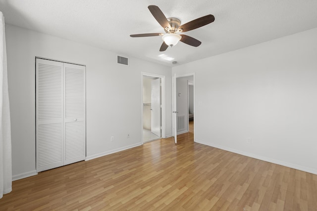 10531 NW 57th St, Coral Springs, FL 33076 - unfurnished bedroom featuring light wood-style floors, baseboards, a closet, and a ceiling fan