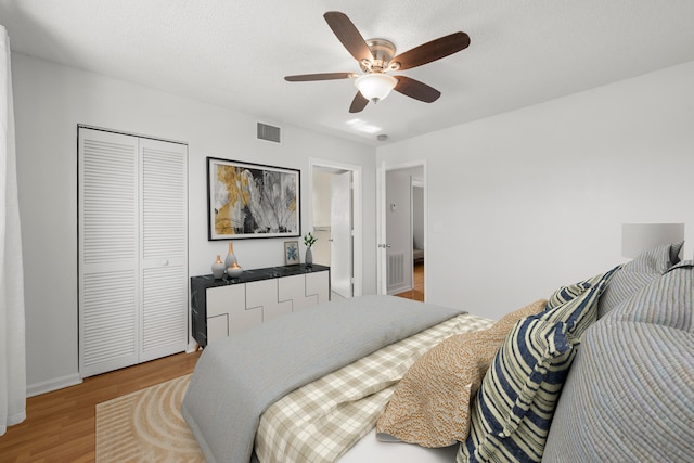 10531 NW 57th St, Coral Springs, FL 33076 - bedroom featuring a closet, light wood-type flooring, ceiling fan, and baseboards