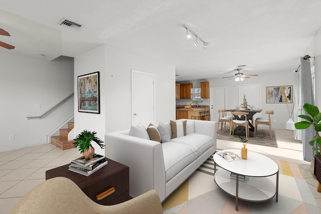 10531 NW 57th St, Coral Springs, FL 33076 - living area with a ceiling fan and stairway