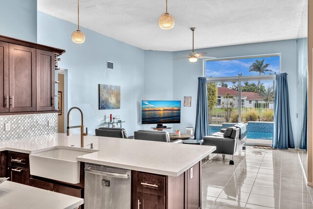 kitchen featuring recessed lighting, tasteful backsplash, wall chimney range hood, and stainless steel appliances