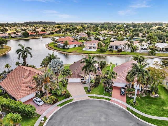 bird's eye view featuring a residential view and a water view
