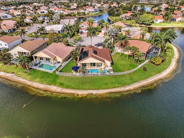 aerial view featuring a residential view and a water view