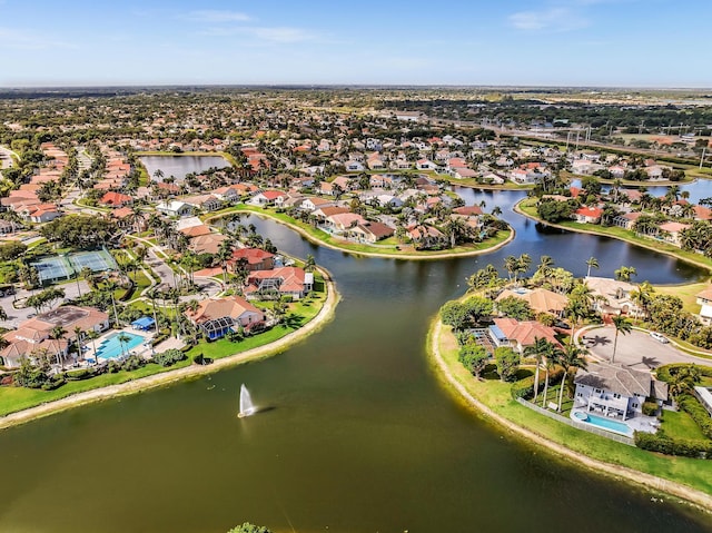 bird's eye view featuring a residential view and a water view