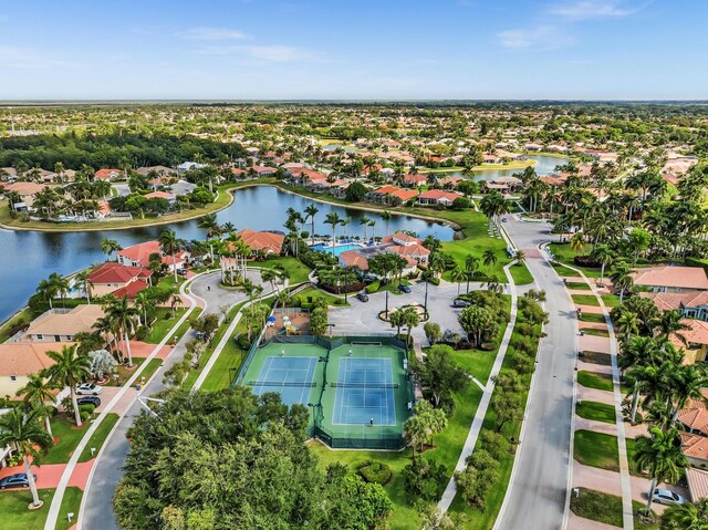 bird's eye view featuring a water view and a residential view