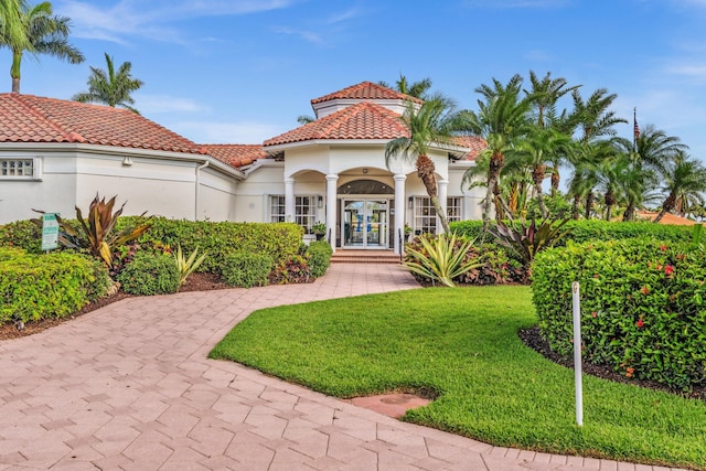 19323 King Palm Ct, Boca Raton, FL 33498 - view of front of home with french doors, stucco siding, a tile roof, and a front yard