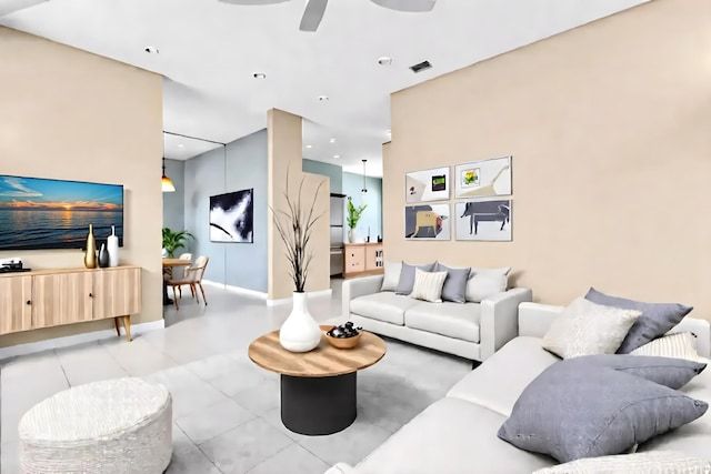 living room with visible vents, recessed lighting, baseboards, and ceiling fan