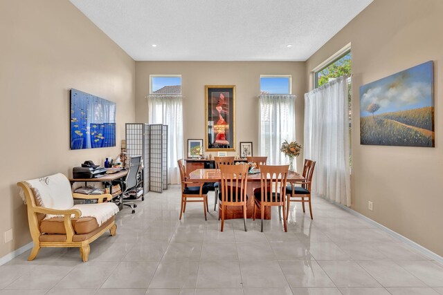 dining space featuring light tile patterned floors, a notable chandelier, and visible vents