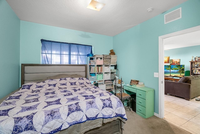 bedroom featuring visible vents and carpet