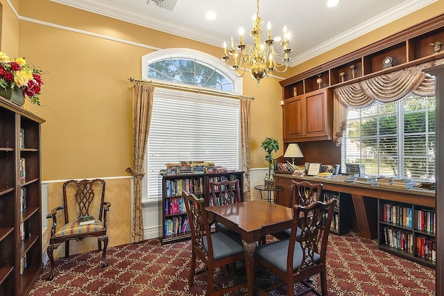 dining area featuring an inviting chandelier, a wainscoted wall, ornamental molding, and carpet floors