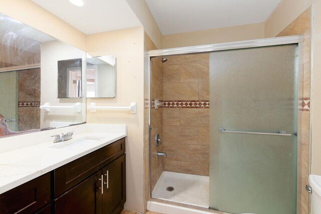 2650 SW Acco Rd, Port Saint Lucie, FL 34953 - bathroom with vanity and tiled shower