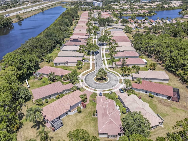 606 SW Treasure Cv, Port Saint Lucie, FL 34986 - aerial overview of property's location with a large body of water and nearby suburban area
