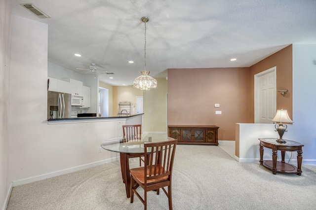 606 SW Treasure Cv, Port Saint Lucie, FL 34986 - dining space with light colored carpet, recessed lighting, baseboards, and a ceiling fan