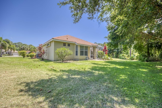 606 SW Treasure Cv, Port Saint Lucie, FL 34986 - view of grassy yard