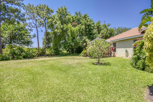 606 SW Treasure Cv, Port Saint Lucie, FL 34986 - view of grassy yard