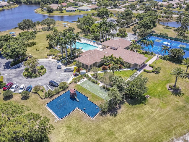 606 SW Treasure Cv, Port Saint Lucie, FL 34986 - drone / aerial view of a nearby body of water and a pool