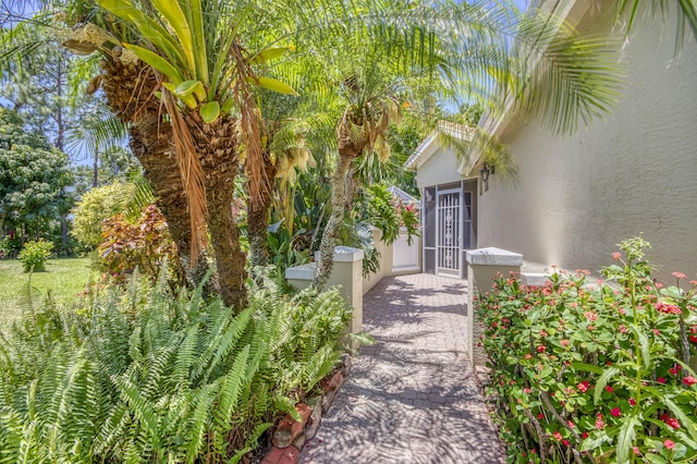 606 SW Treasure Cv, Port Saint Lucie, FL 34986 - property entrance with stucco siding