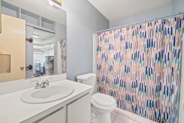 bathroom featuring vanity, tile patterned floors, toilet, and a shower with curtain