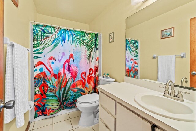 full bathroom with toilet, tile patterned floors, a shower with curtain, and vanity