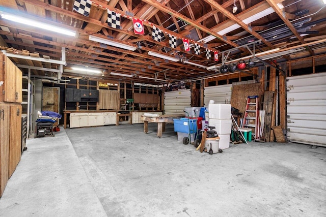 garage featuring a workshop area