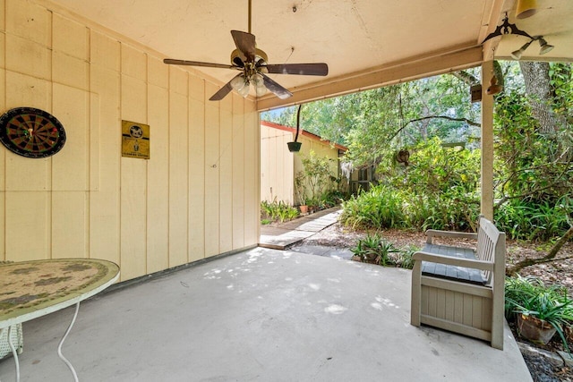 view of patio featuring ceiling fan