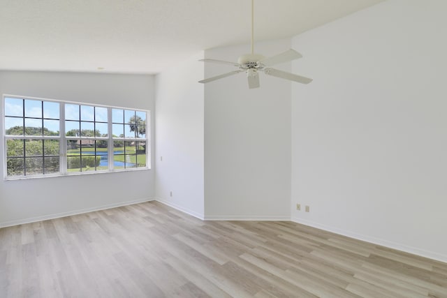 17288 Shoals Dr, Jupiter, FL 33477 - spare room featuring vaulted ceiling, light wood finished floors, and ceiling fan