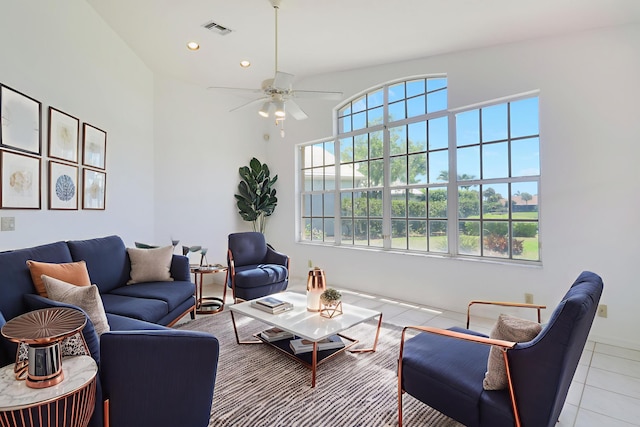 17288 Shoals Dr, Jupiter, FL 33477 - living area featuring light tile patterned flooring, recessed lighting, a ceiling fan, and a high ceiling