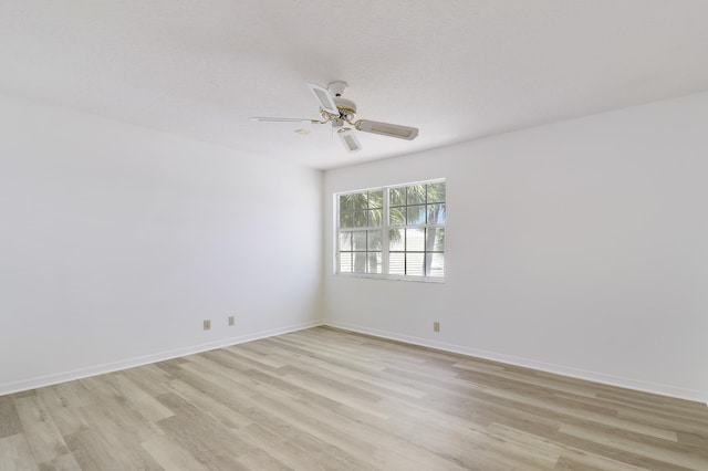 17288 Shoals Dr, Jupiter, FL 33477 - empty room with light wood finished floors and ceiling fan