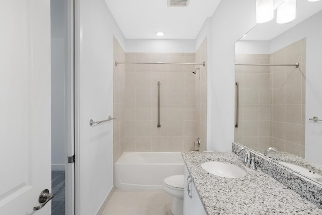 full bath featuring shower / bathtub combination, tile patterned flooring, vanity, and toilet