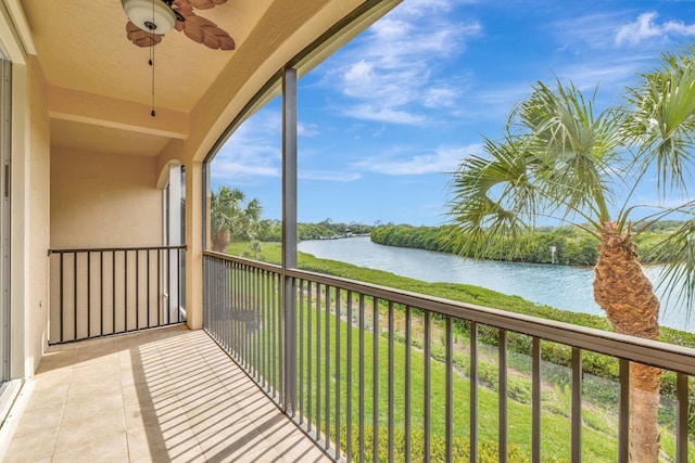 unfurnished sunroom featuring a water view