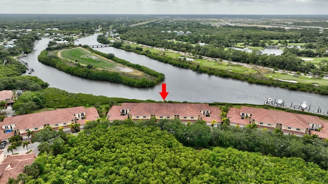 birds eye view of property featuring a water view and a residential view