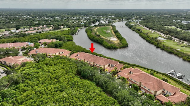 birds eye view of property featuring a water view and a residential view
