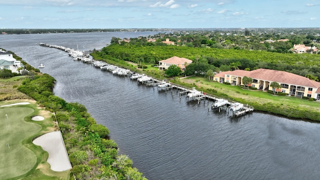 drone / aerial view featuring a water view and golf course view