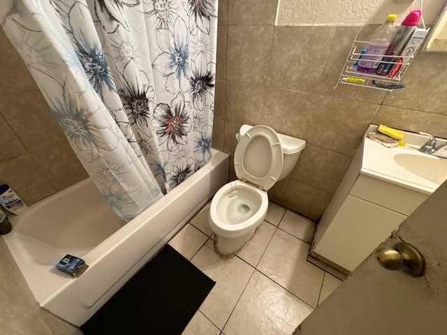 410 S F St, Lake Worth, FL 33460 - full bathroom featuring tile walls, toilet, shower / tub combo with curtain, tile patterned flooring, and vanity