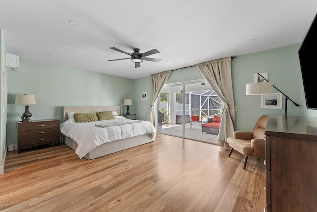 bedroom featuring light wood-style floors, ceiling fan, and access to exterior