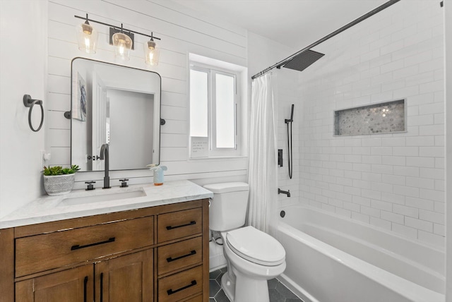 bathroom featuring vanity, toilet, and shower / tub combo with curtain