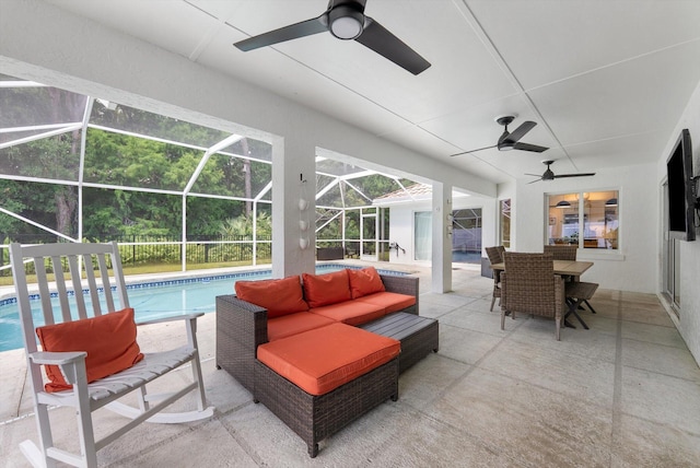 view of patio featuring an outdoor hangout area, outdoor dining area, ceiling fan, and an outdoor pool