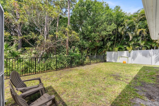view of yard featuring a fenced backyard