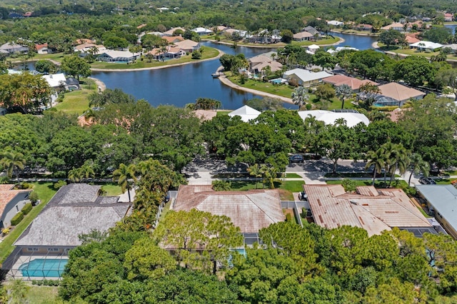 bird's eye view with a residential view and a water view