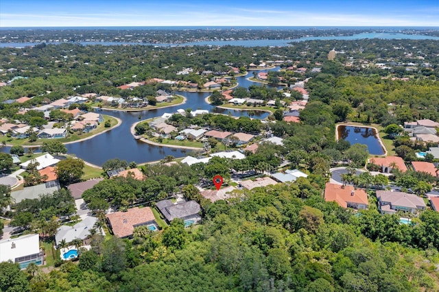 bird's eye view with a water view and a residential view