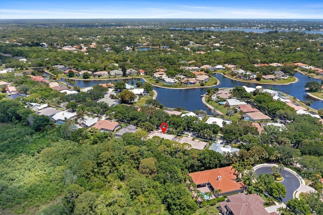bird's eye view with a water view and a residential view