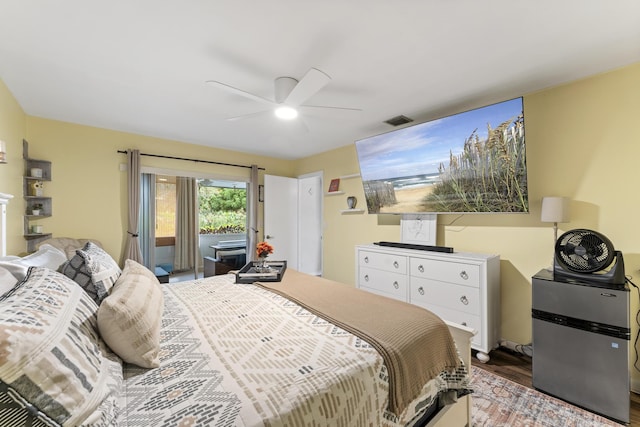 11711 Laurel Valley Cir, Wellington, FL 33414 - bedroom featuring visible vents, wood finished floors, and ceiling fan