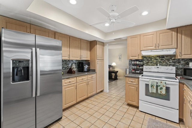11711 Laurel Valley Cir, Wellington, FL 33414 - kitchen featuring light tile patterned floors, a ceiling fan, dark countertops, stainless steel appliances, and under cabinet range hood