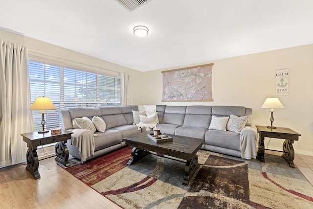11711 Laurel Valley Cir, Wellington, FL 33414 - living room with baseboards, visible vents, and wood finished floors