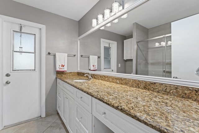 11711 Laurel Valley Cir, Wellington, FL 33414 - full bathroom featuring a stall shower, tile patterned flooring, and vanity