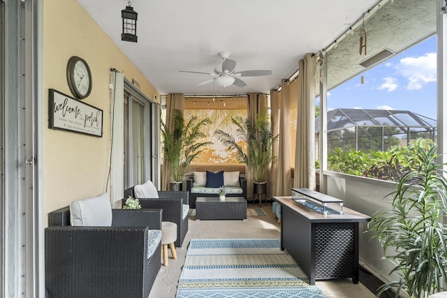 11711 Laurel Valley Cir, Wellington, FL 33414 - sunroom / solarium with an outdoor living space with a fire pit and ceiling fan