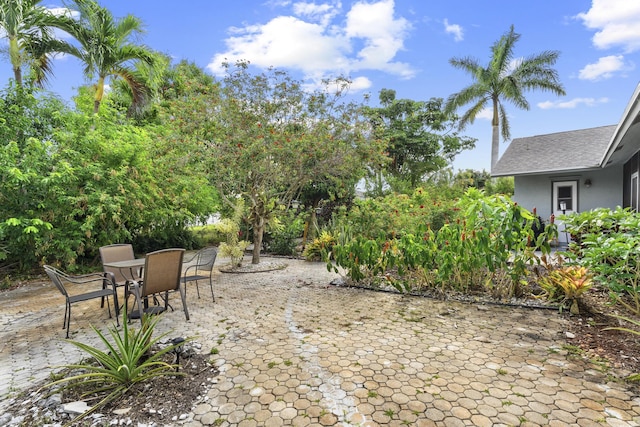 11711 Laurel Valley Cir, Wellington, FL 33414 - view of yard featuring a patio area and outdoor dining space