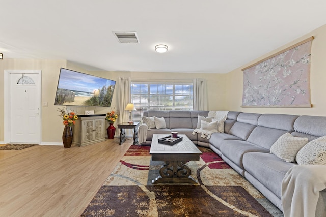 11711 Laurel Valley Cir, Wellington, FL 33414 - living area with baseboards, visible vents, and wood finished floors