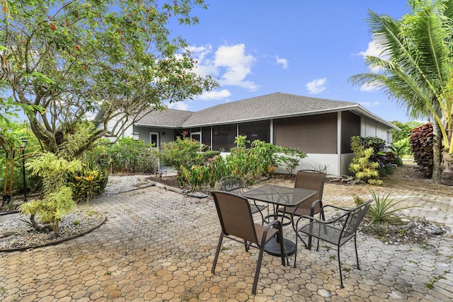 11711 Laurel Valley Cir, Wellington, FL 33414 - view of patio with outdoor dining space and a sunroom